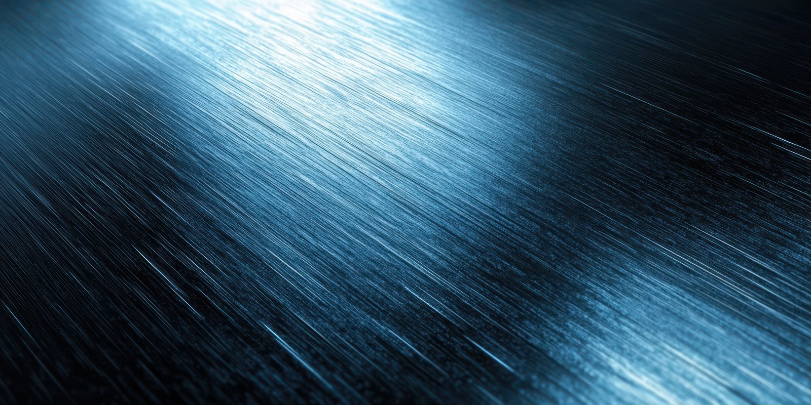 Visually striking close-up of reflective metallic surface with subtle light patterns and textures at night